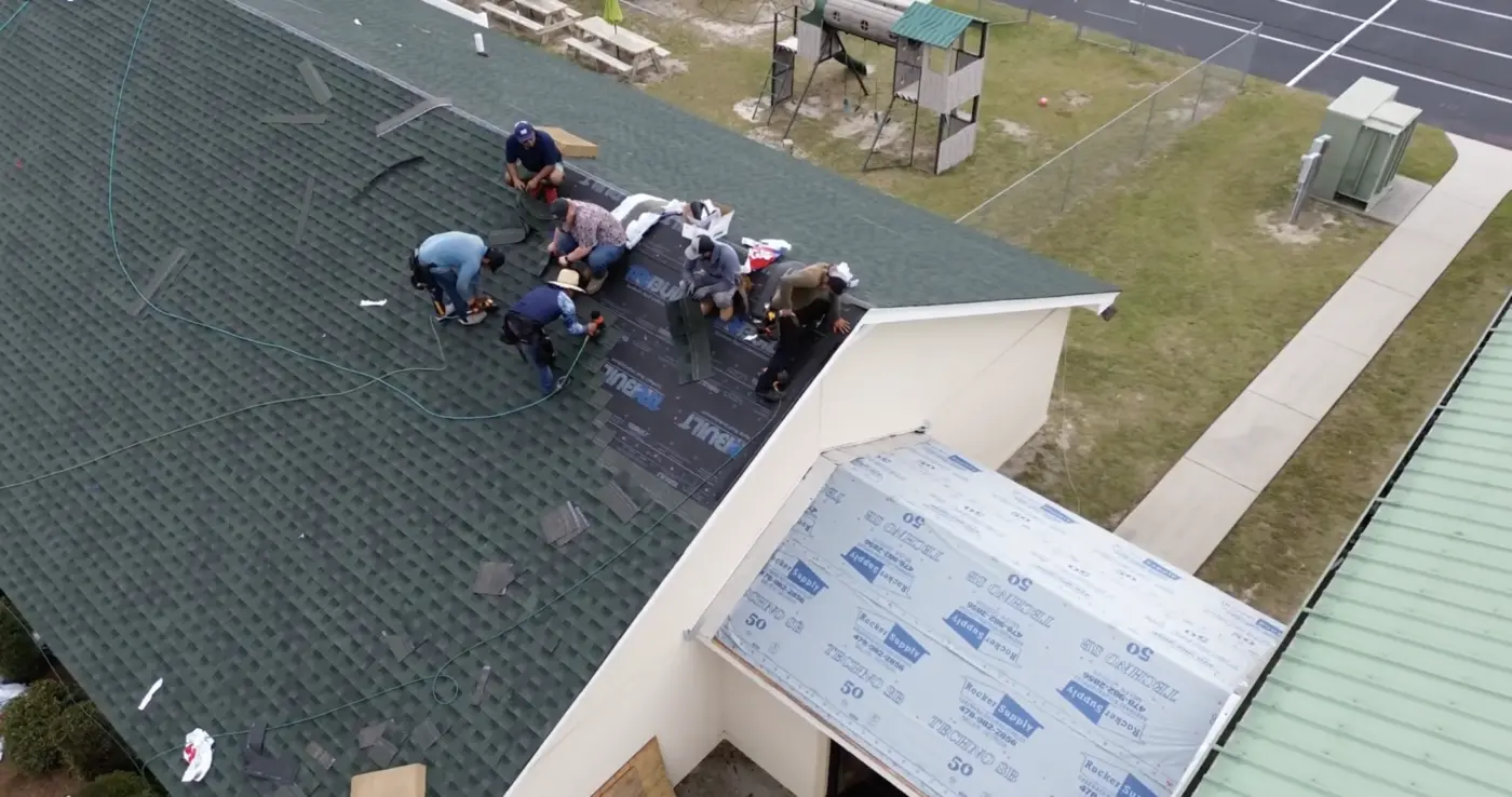 roofers roofers replacing a commercial roof